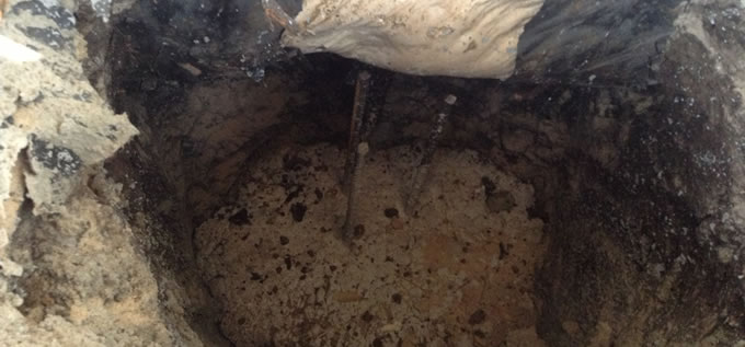 Exterior concrete slab foundation repair process photo 13 in Corpus Christi, Texas