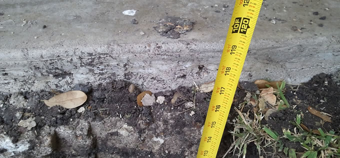 Exterior concrete slab foundation repair process photo 6 in Corpus Christi, Texas