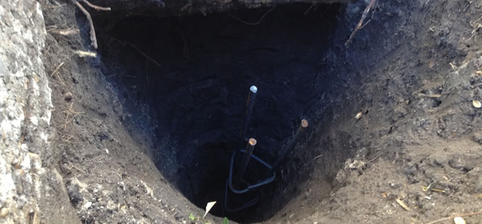 Exterior concrete slab foundation repair process photo 8 in Corpus Christi, Texas